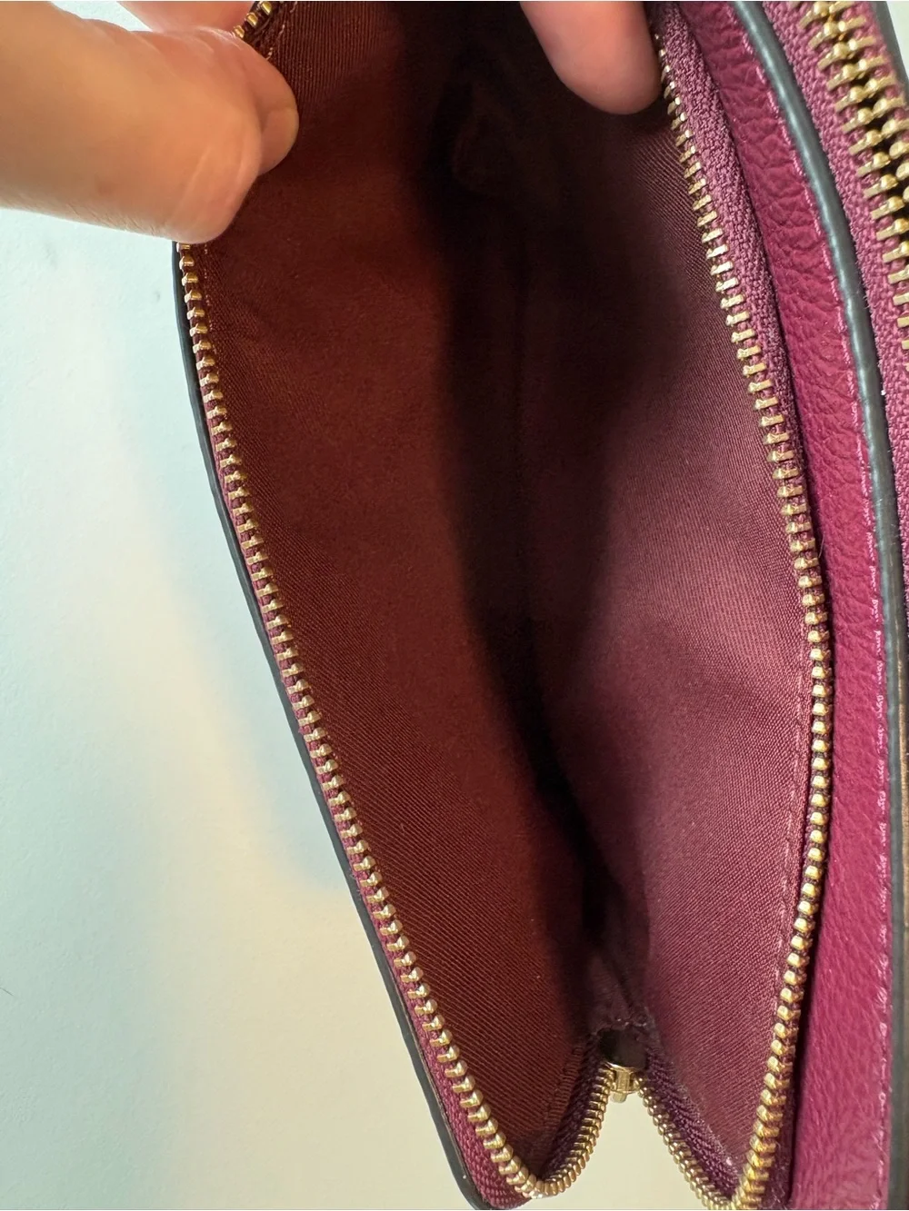 Coach corner zip